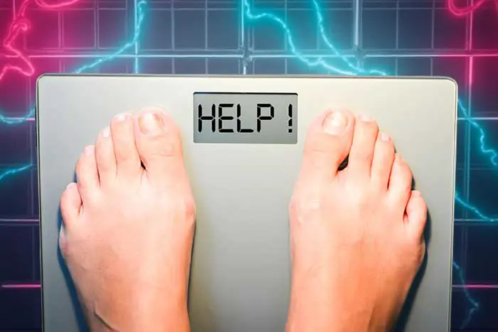 Êtes-vous obèse sans le savoir ? 10 Obesite pesee